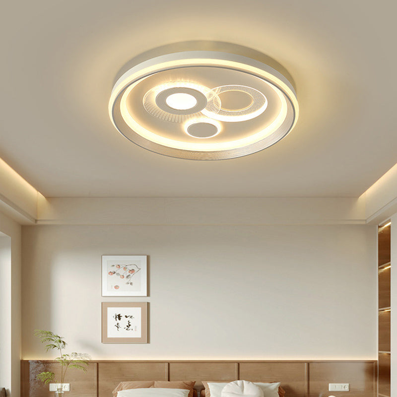 Scena di camera da letto installata con plafoniera a LED geometrica rotonda