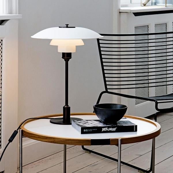 Opal glass table lamp detail with metal stem
