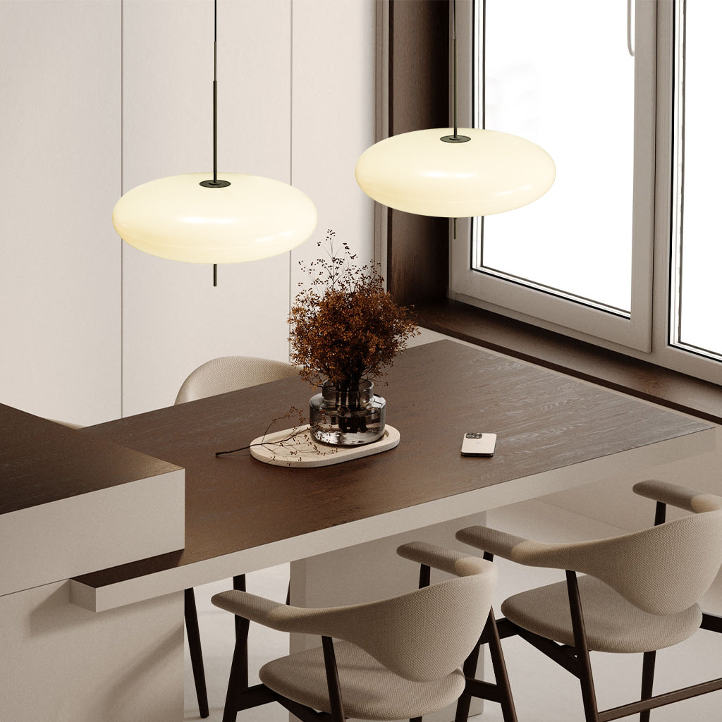Claudio Saucer Pendant Light two white dinning room.jpg__PID:e47a798b-6267-4656-aea8-c8ce8bd1fbe0