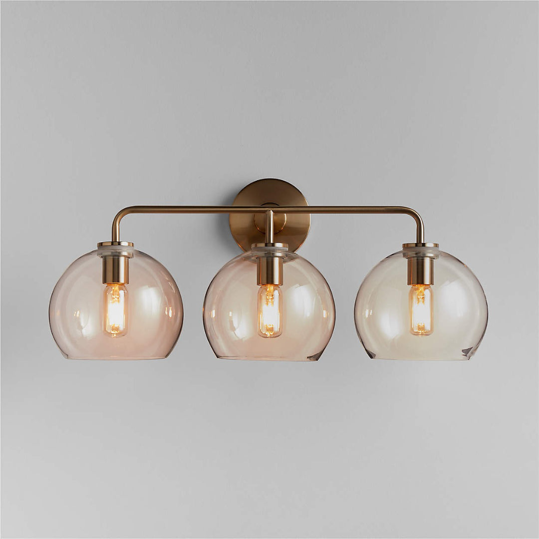 Orson moderne glazen metalen bol wandkandelaar helder messing.webp__PID:67336a4d-205a-45a6-b047-af83a6211ec9