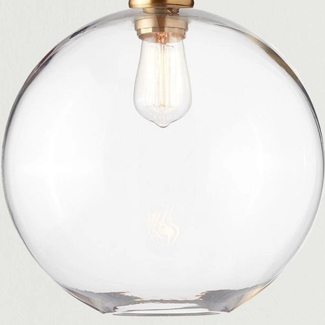 Claire Moderne Kugel-Pendelleuchte aus klarem Glas detail3.webp__PID:2b5a649d-ac1f-4048-bd8e-eb0261be6fcf